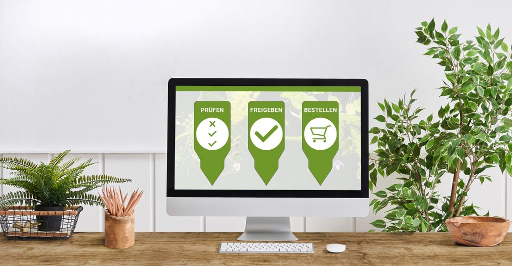 Home office computer room desktop screen vase of plant frame and